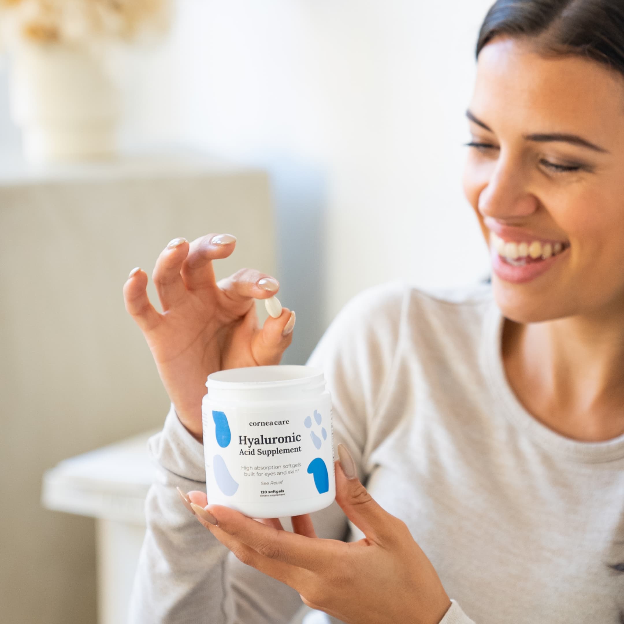 Hyaluronic Acid Supplement Model Holding Bottle and Supplement