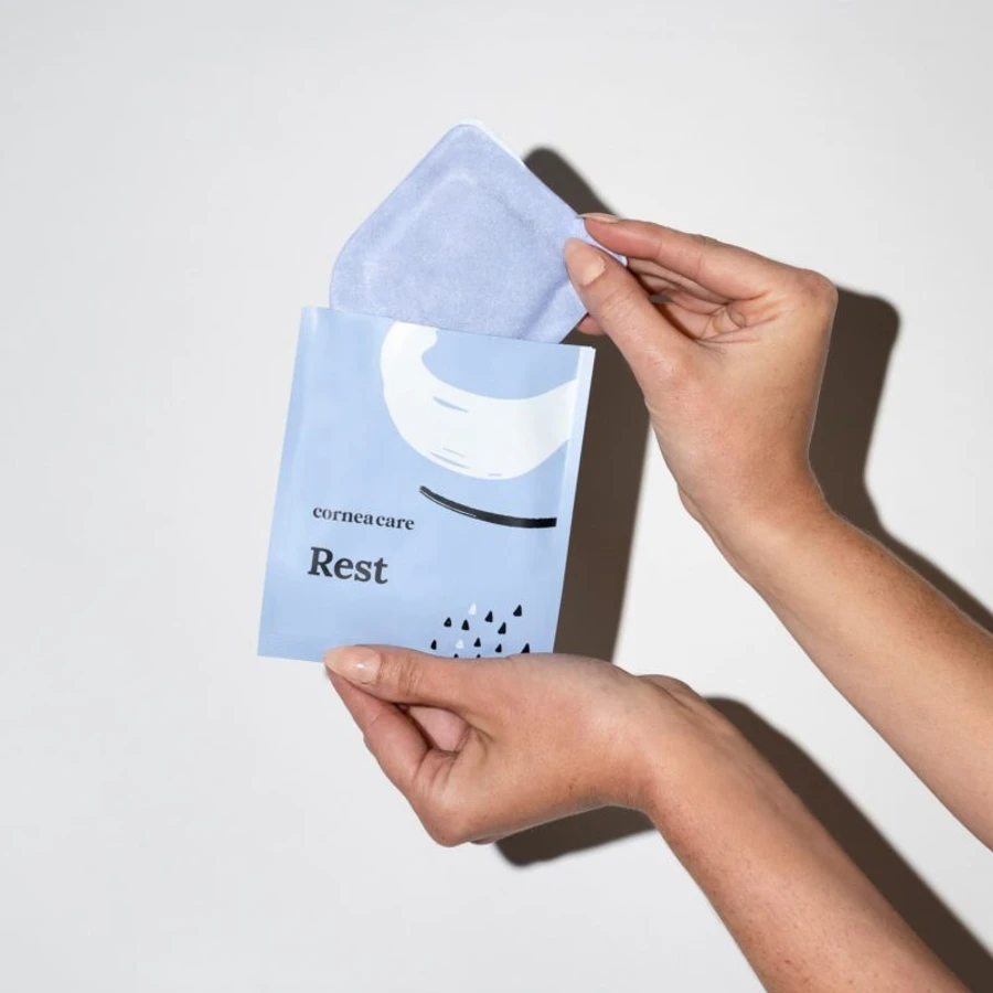 Rest Self Heating Warm Compresses Hands hold mask and packet